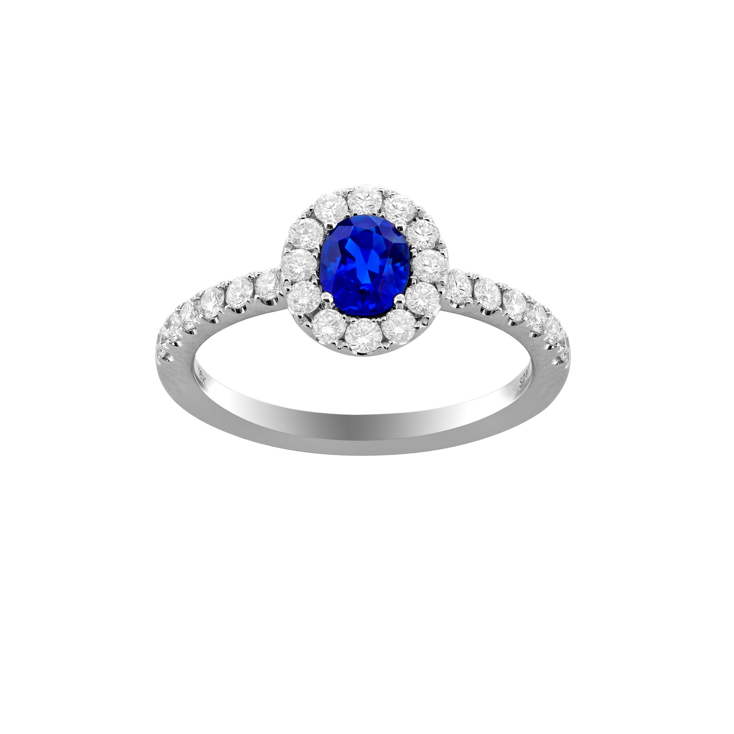 White 18 karat sapphire diamond halo ring by Spark Creations