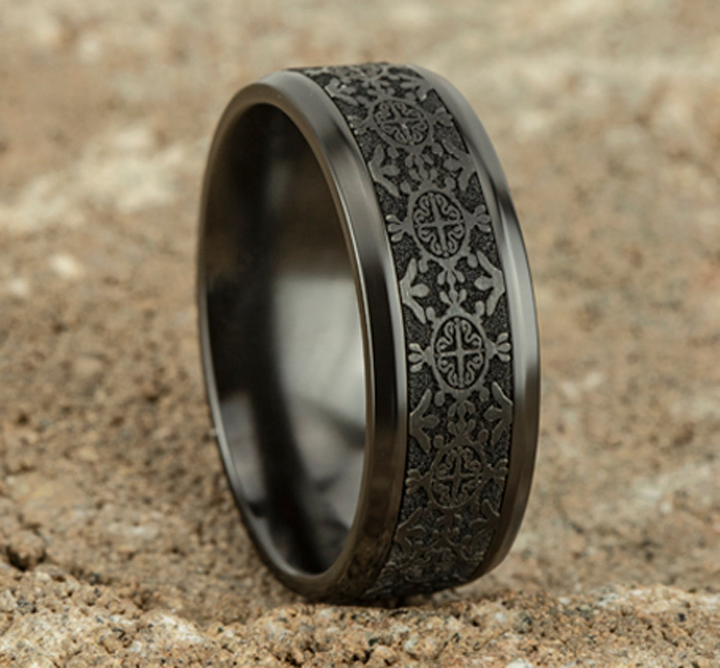 Black leather crossbody bag with gold hardware.