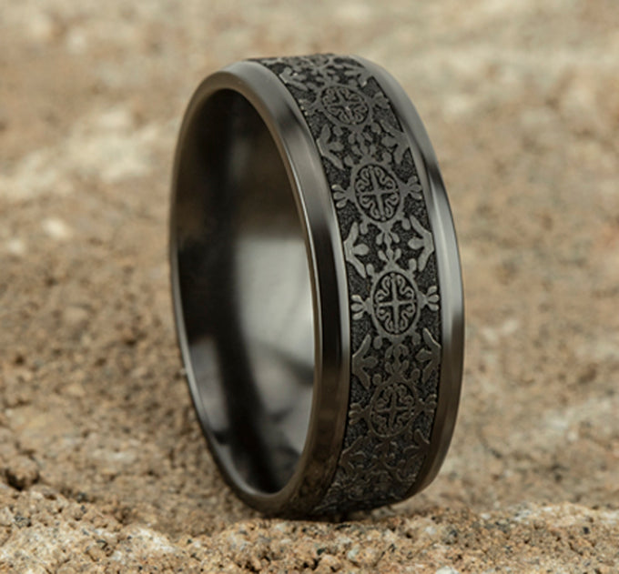 Black leather crossbody bag with gold hardware.