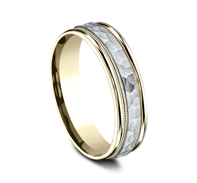 Gold bangle bracelet with intricate design