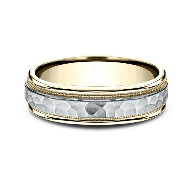 Gold bangle bracelet with intricate design