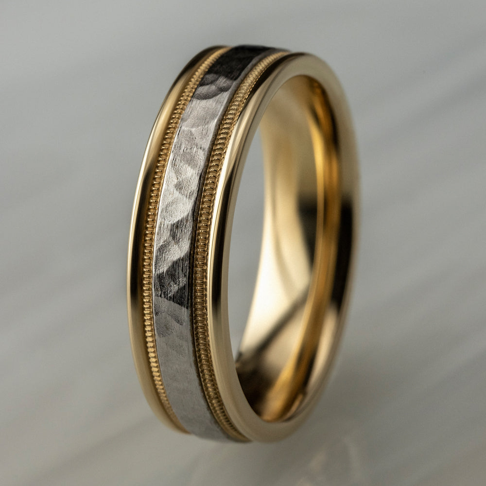 Gold bangle bracelet with intricate design