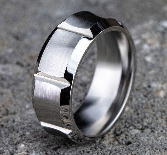 Black leather gauntlet with silver studs and buckle detailing.